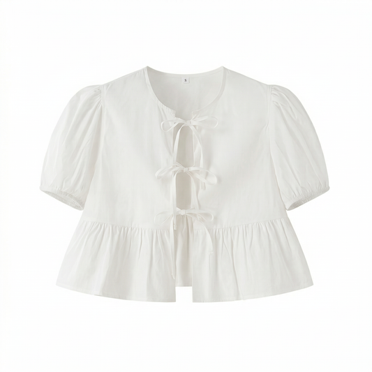 Blusa corta con volantes y mangas abullonadas